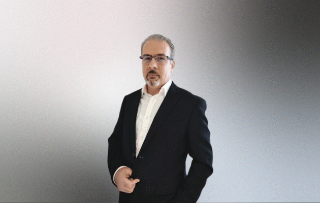 Photo of Dr Zakwan Jaroucheh on grey background