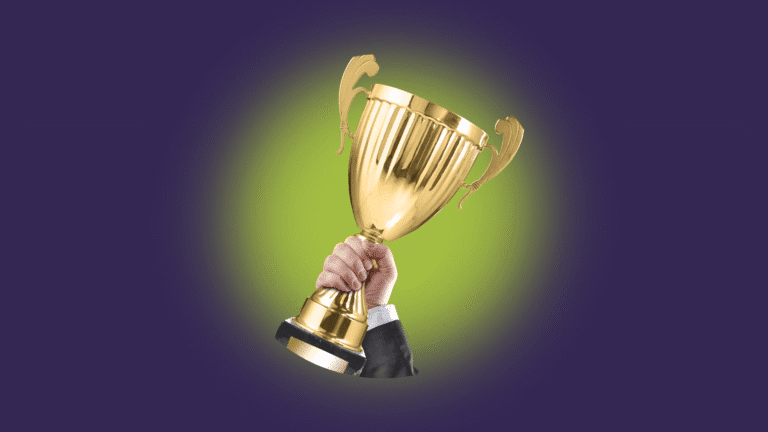 image depicts a hand holding a trophy, this image sits alongside a list of prizes in the data visualisation competition