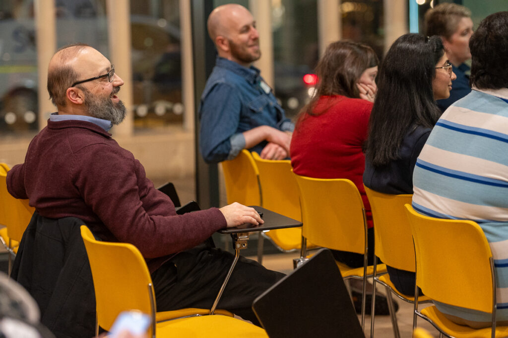 Photo of adult learners sitting in a small lecture theatre