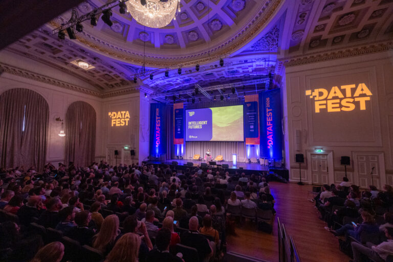 Colin Ife on stage in a filled crowd at DataFest 2026