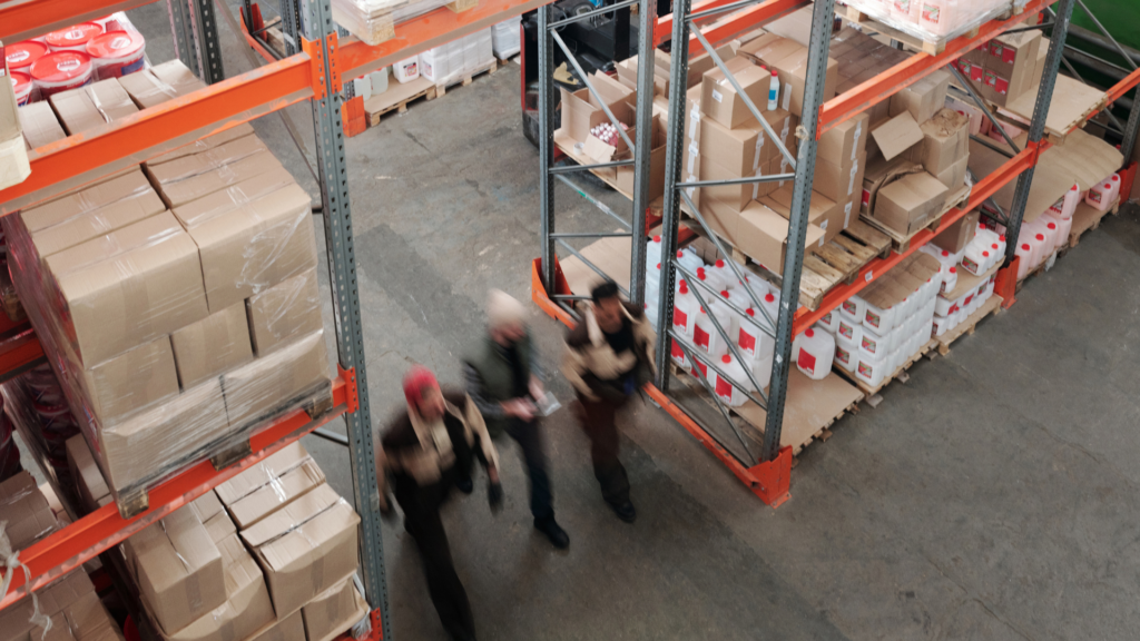 People walking through a warehouse